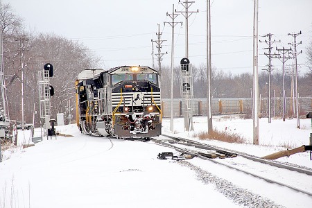 The head end of the 287 has entered the crossover to regain the main line.