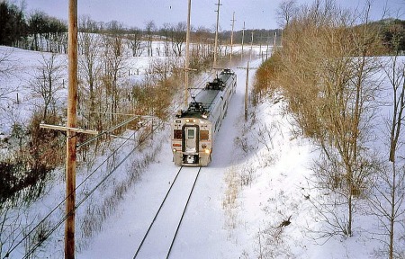 A South Shore train rolls through the countryside near Hudson Lake, Ind.