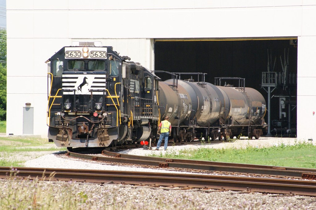 NS local C27 shoves tank cars into the new Smuckers facility at Orrville on June 18, 2013.