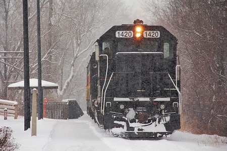 Snow is falling as the CVSR Scenic arrives in Akron about five minutes ahead of its scheduled 9:55 a.m. arrival. On the head end, unfortunately, is that LTEX black geep. 