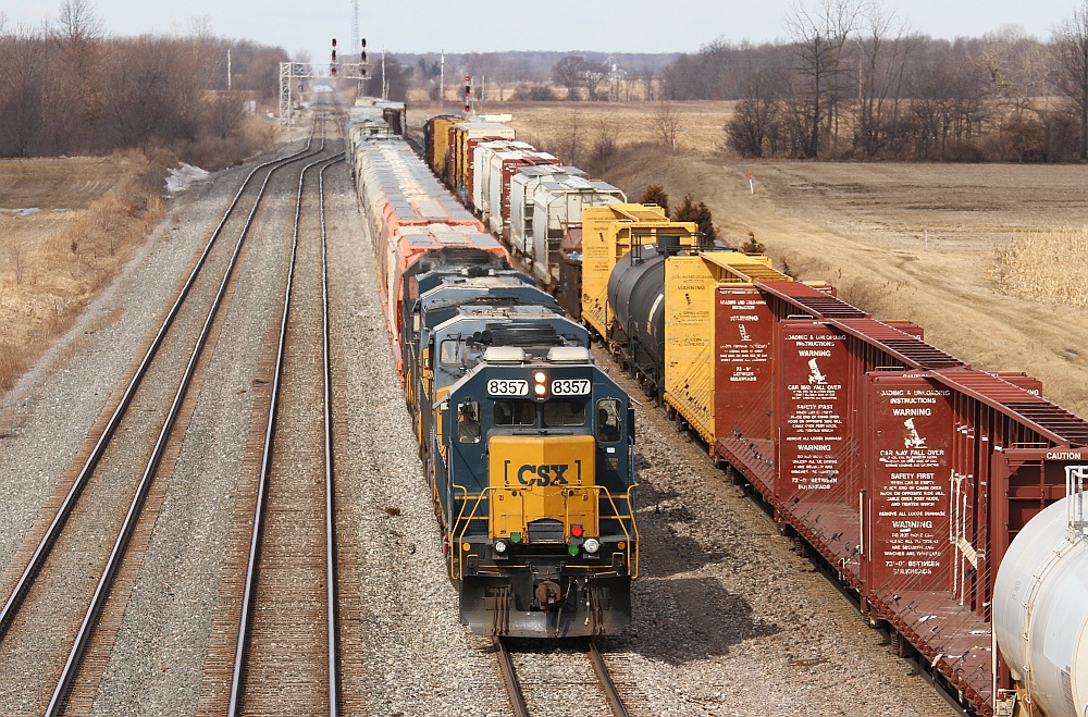 CSX 8357, Clinchfield 3023 in a former life, leads an eastbound mixed freight into Willard.