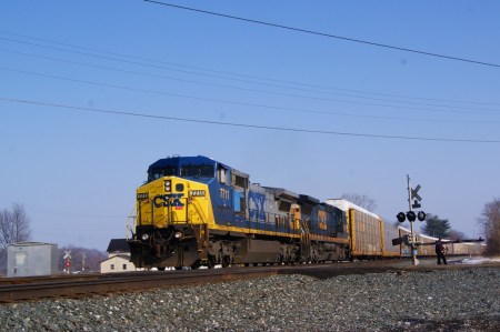 CSX auto rack Q299 is westbound at Sterling.