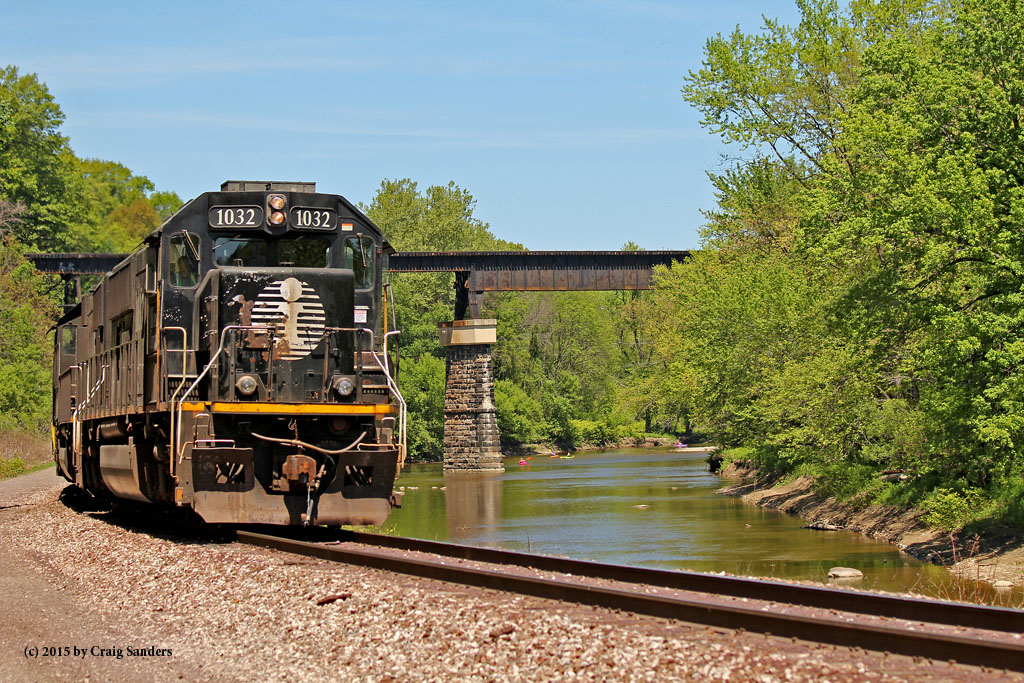 My favorite image of the day was made when the train sauntered out of town along Conneaut Creek with the ex-Nickel Plate trestle in the background.