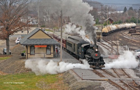 Getting up a head of steam after the conductor gave the highball command.