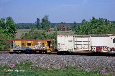 It was just like old times, but we were still surprised to see a caboose on the rear of this eastbound CSX train.