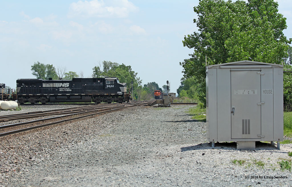 NS crosses at Attica Junction while CSX waits. Later it would be the other way around.